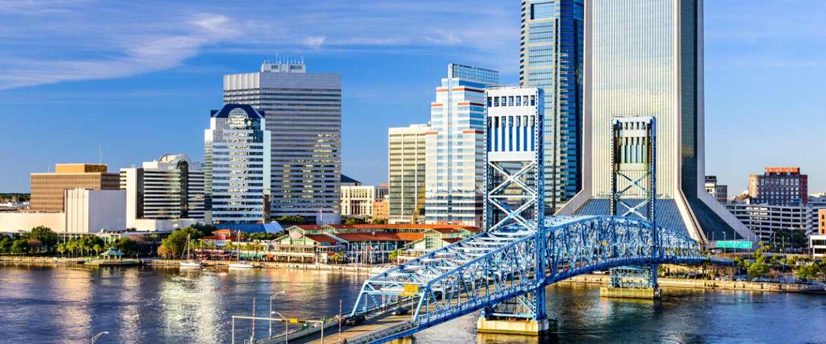 A view of the Jacksonville, FL, skyline from the Saint Johns River during the day.