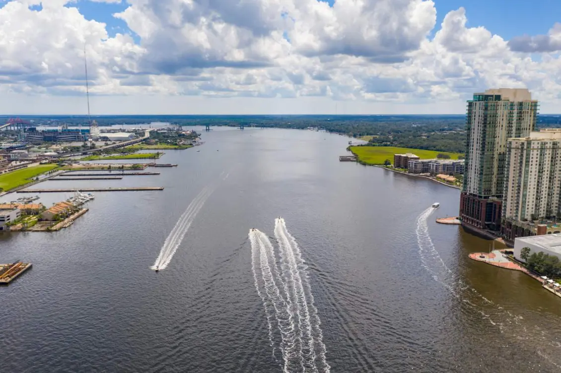 St. John’s River in Jacksonville, FL, on a bright day with fluffy clouds.