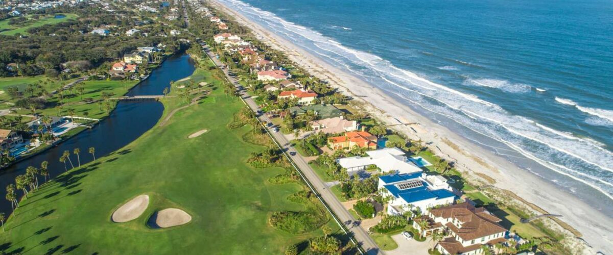 Aerial View of Ponte Vedra Beach, Jacksonville and a golf course near the shore.