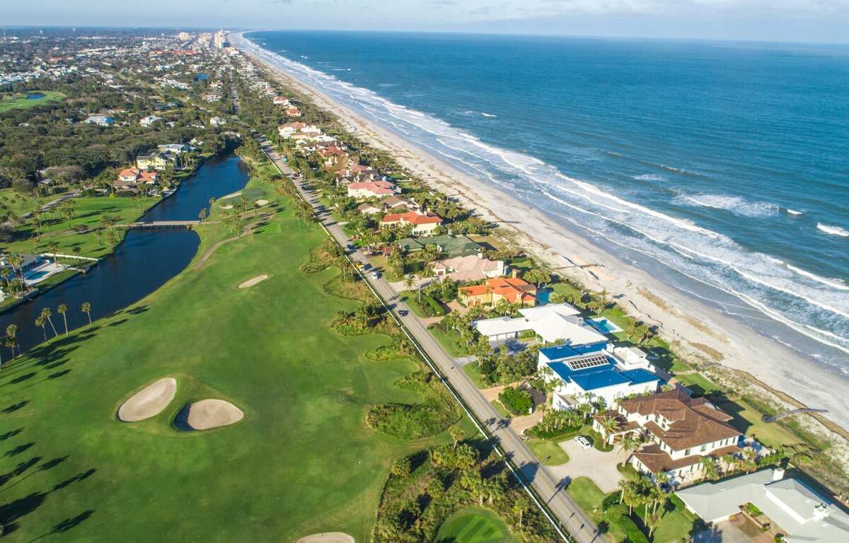 Aerial View of Ponte Vedra Beach, Jacksonville and a golf course near the shore.